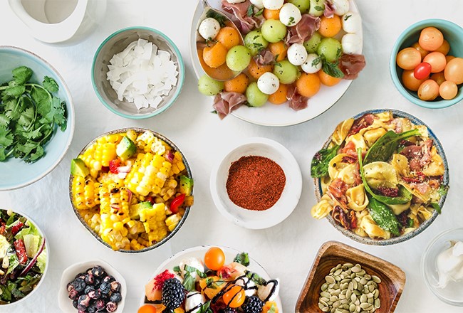 Salads and salad ingredients on a table