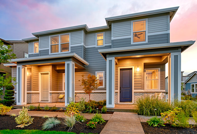 Front of paired homes with covered porches