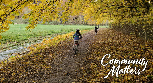 Kids biking on a trail