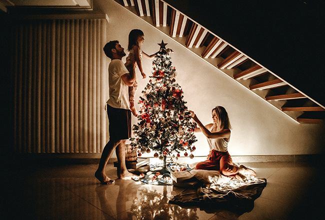 Family decorating tree