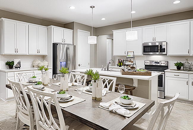 Great room and kitchen with white cabinets