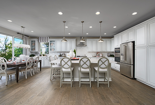 Model home kitchen with luxury vinyl wood-look flooring