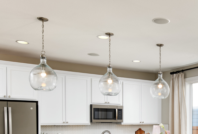 Round pendant light fixtures in a kitchen