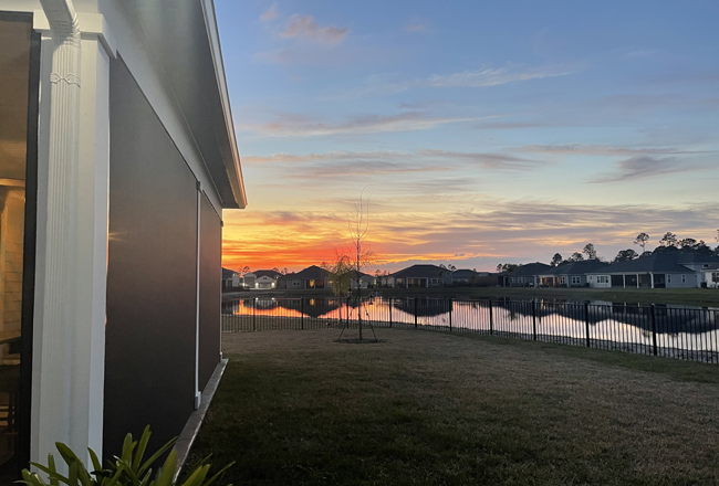 Sunset over a pond in a Richmond American community