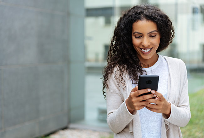 Adult woman looking at cell phone