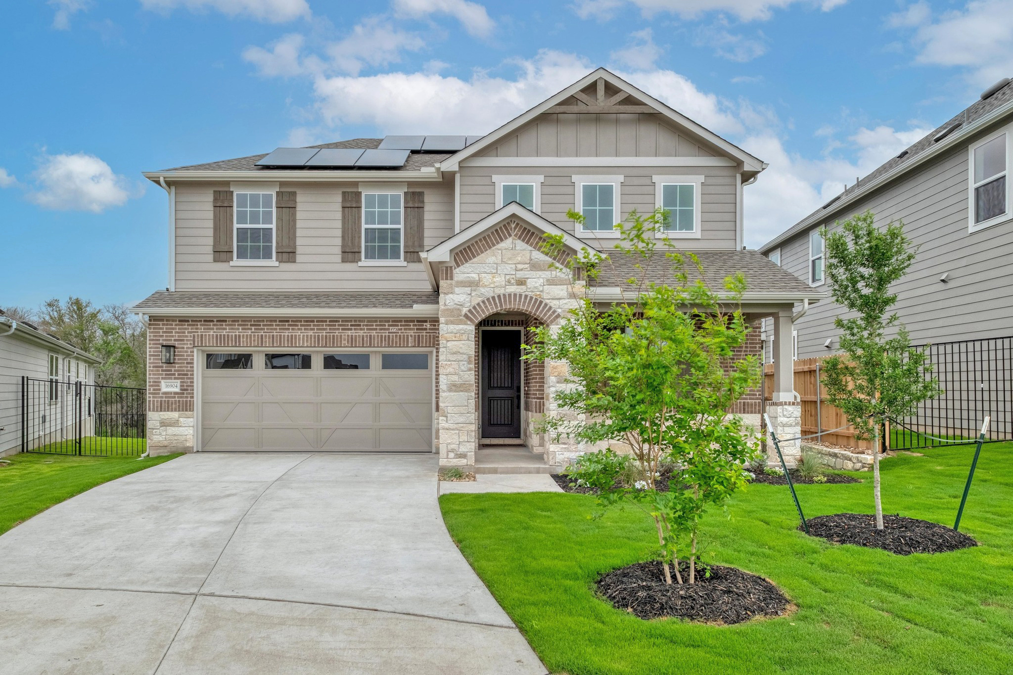 Exterior of a two-story Richmond American home at Whisper Valley in Manor, TX