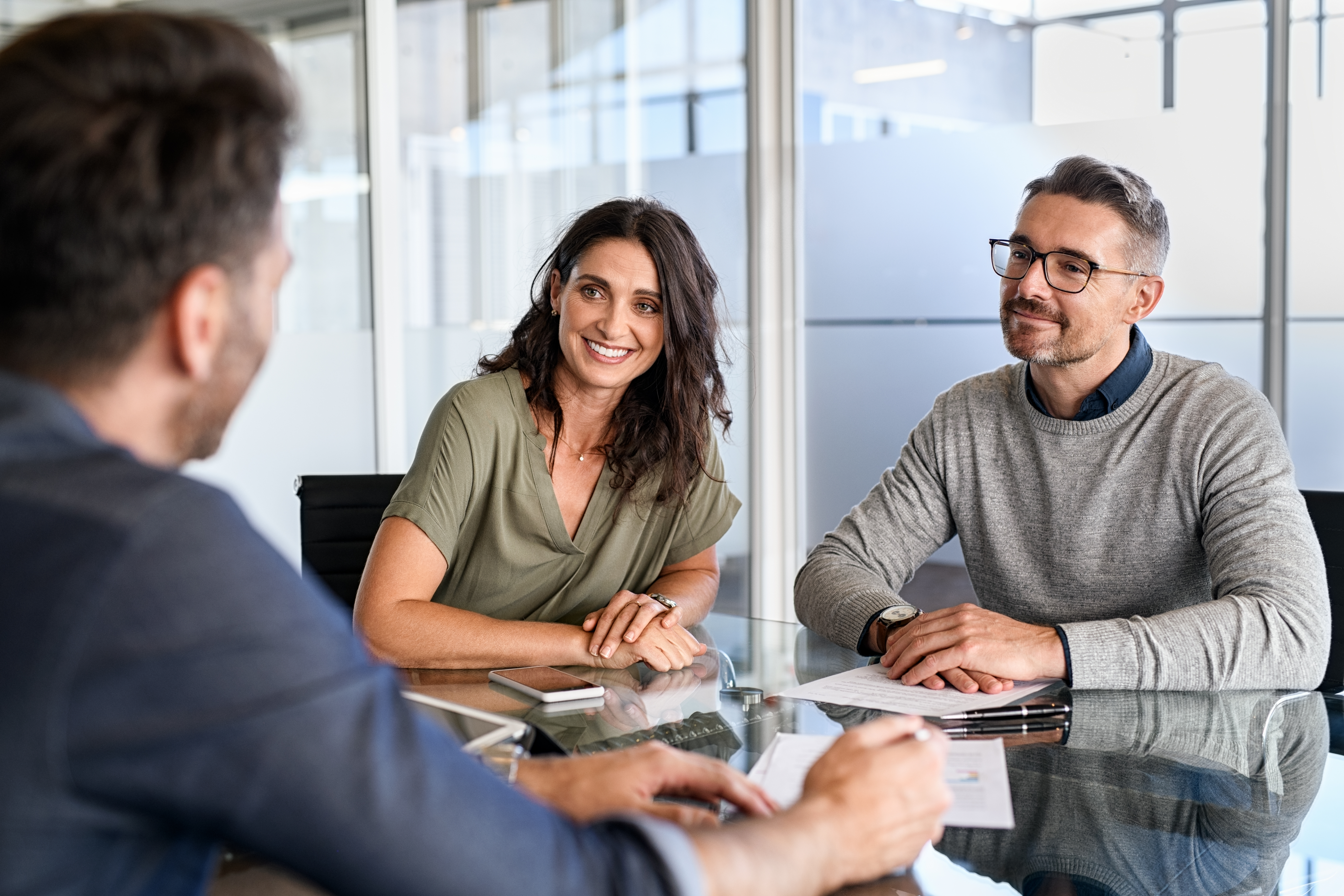 Couple having a conversation with their real estate agent