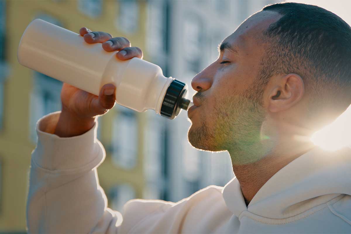 Man drinking a bottle of water
