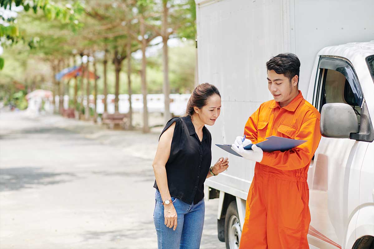 Woman discussing her bill with a mover