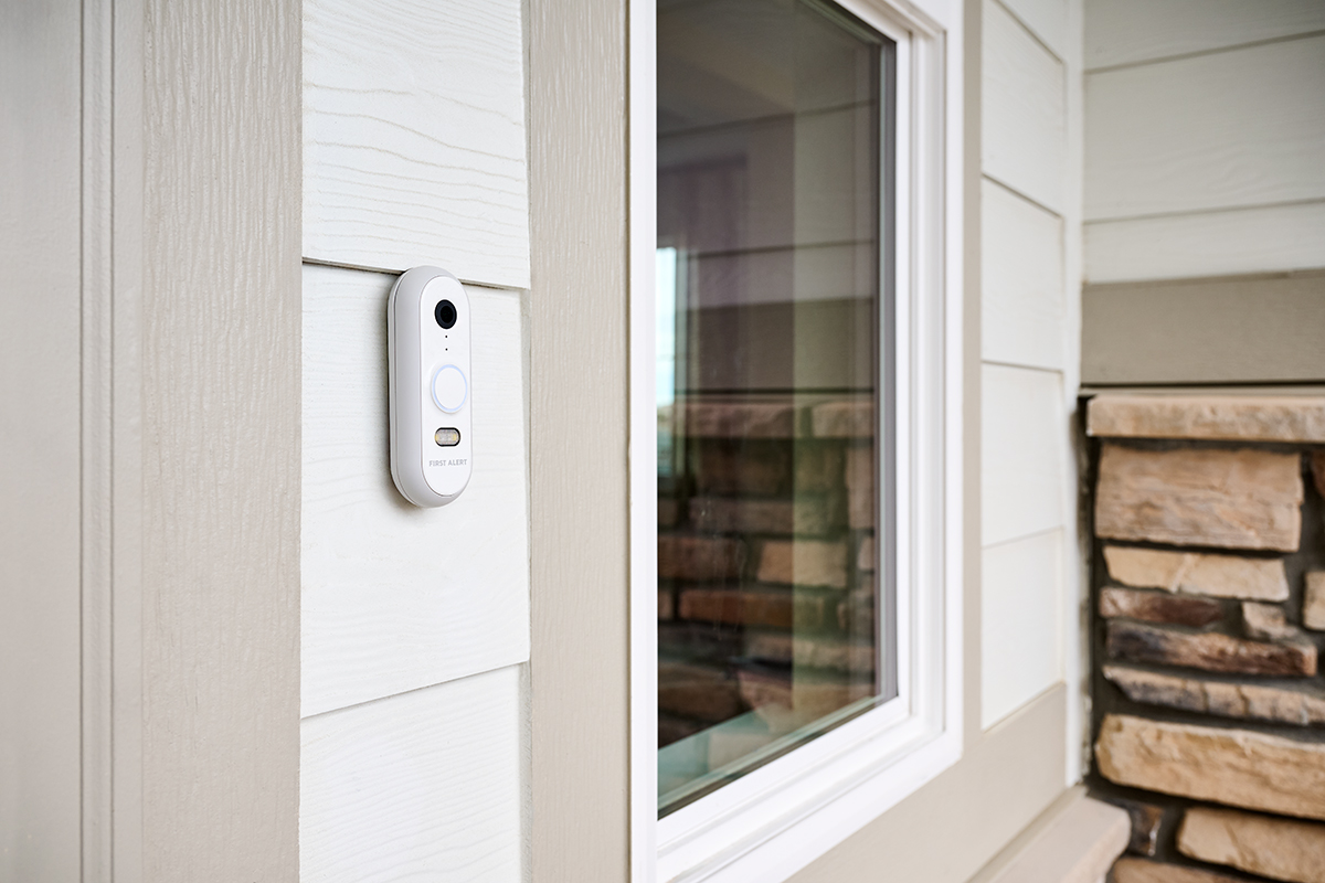 A smart doorbell in front of a Richmond American home