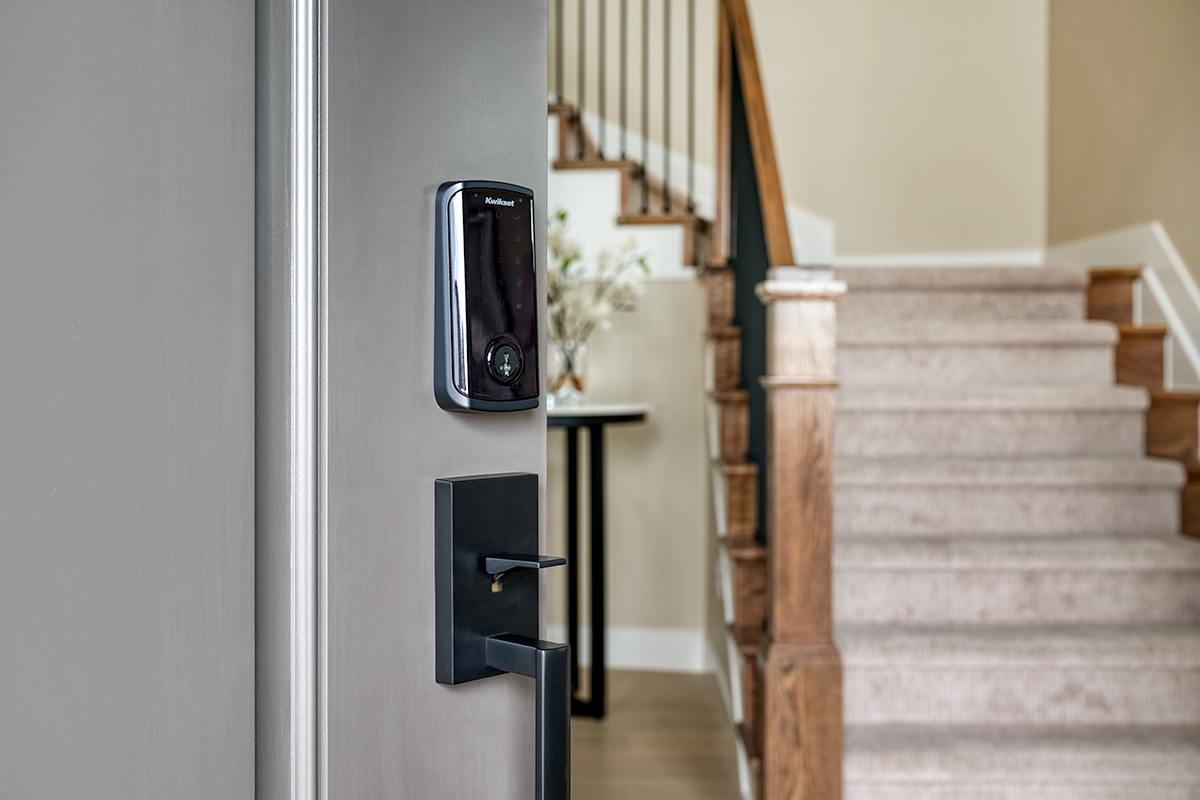A smart lock on a Richmond American home front door