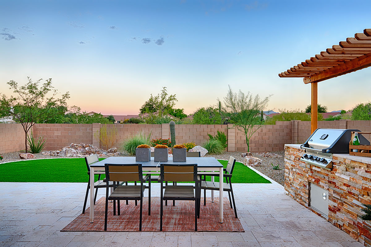outdoor kitchen with a grill outdoor kitchen with a grill and a patio table