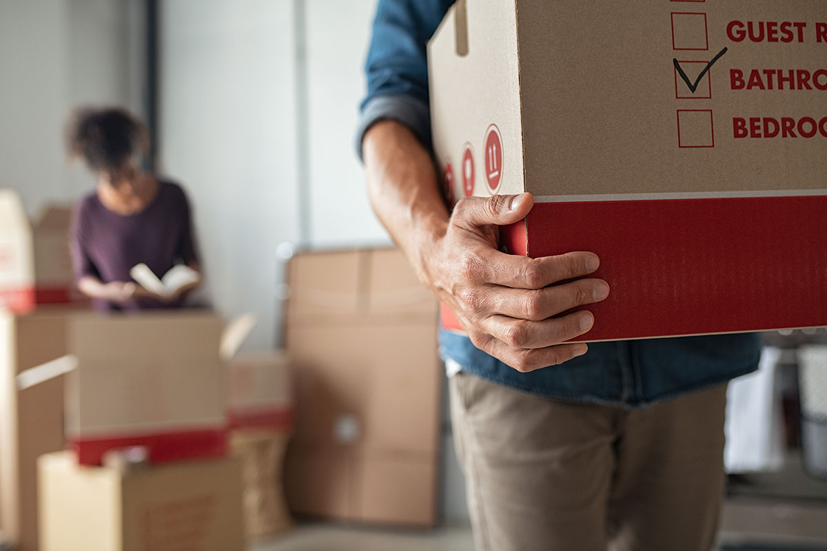 Man moving a box during a move