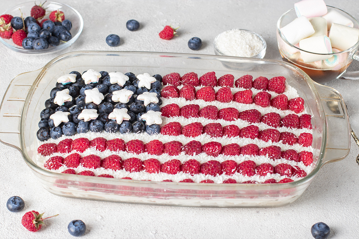 dessert that resembles the USA flag with berries and marshmallows