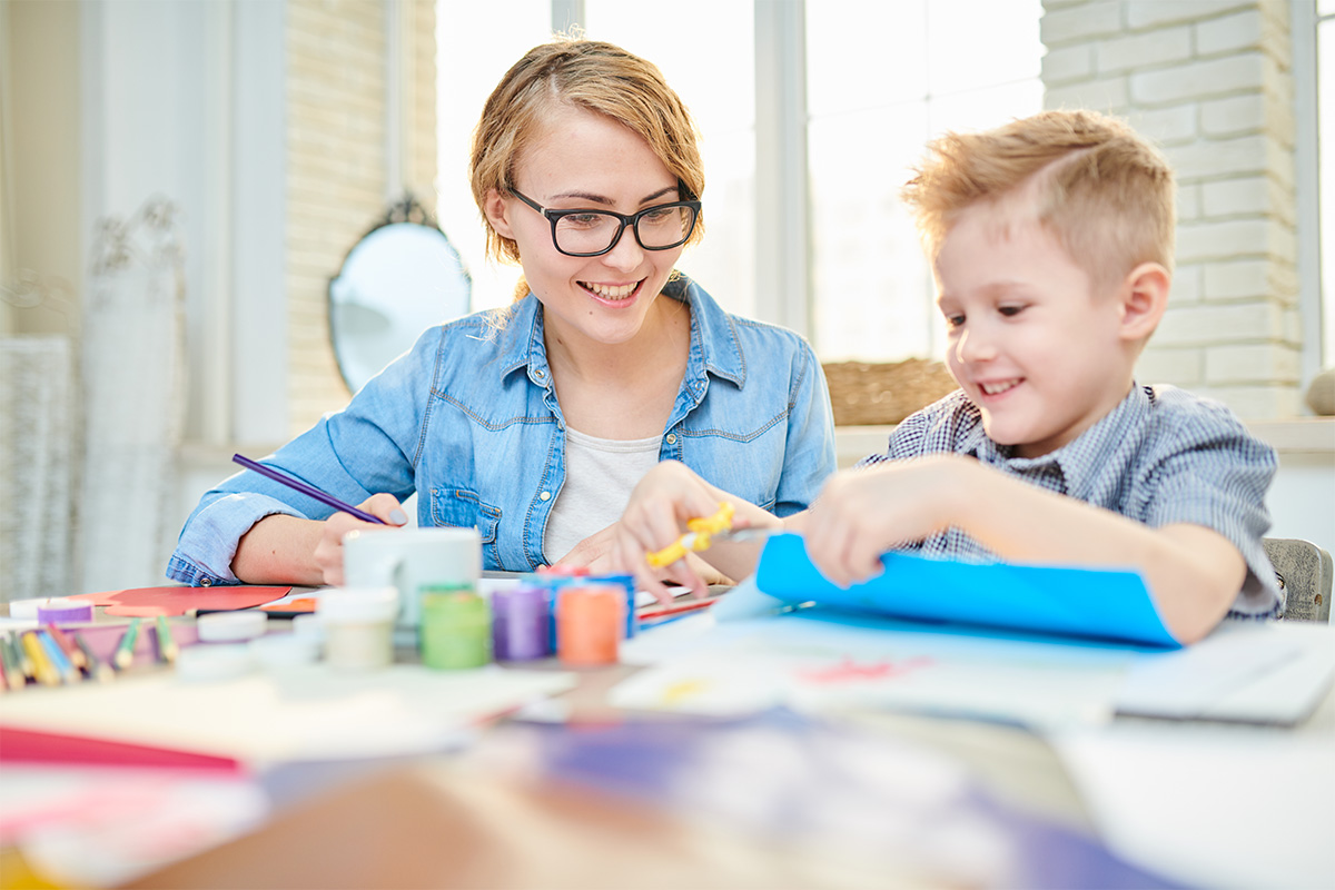 mom and son crafting together