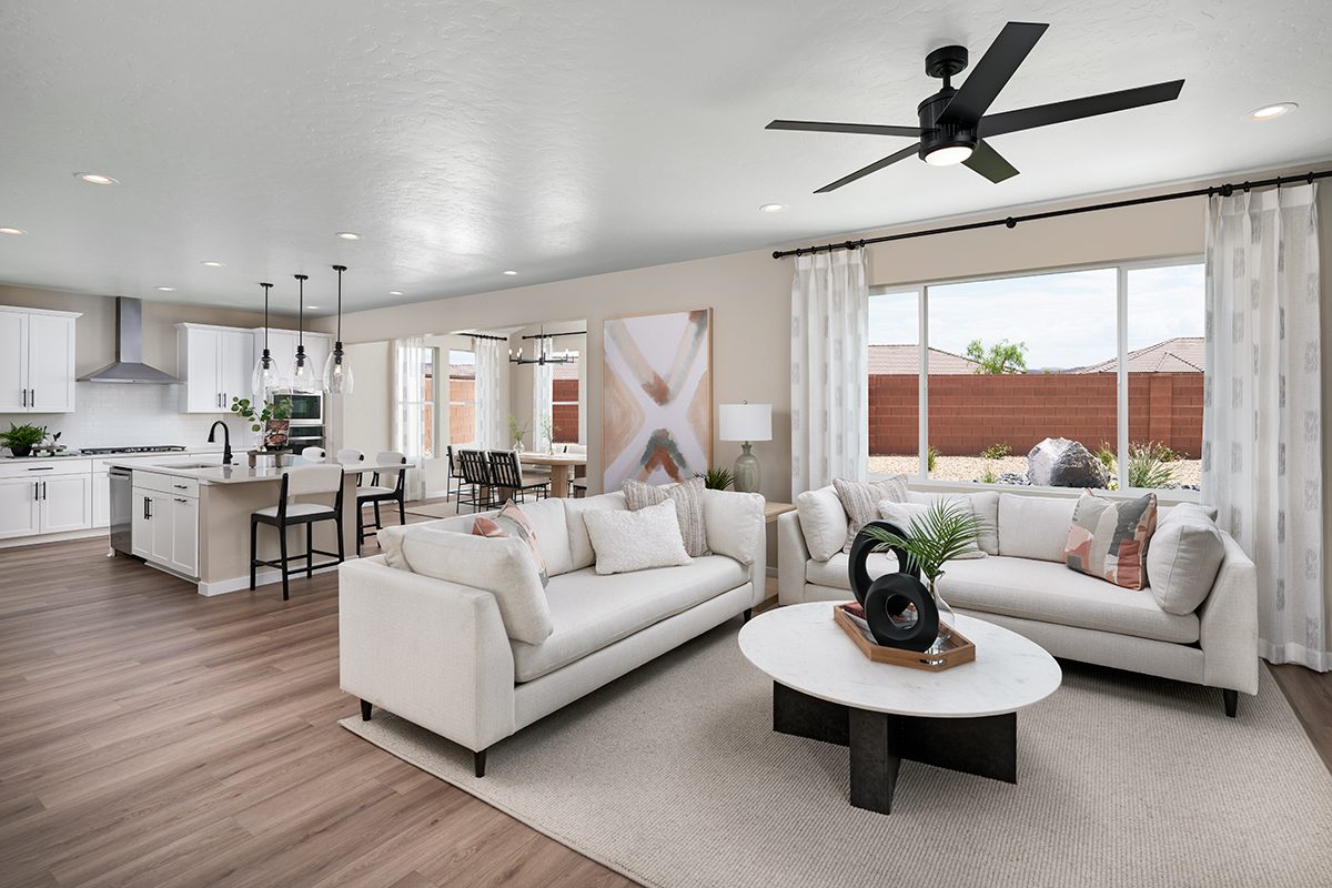 A bright and sunny great room and adjacent kitchen