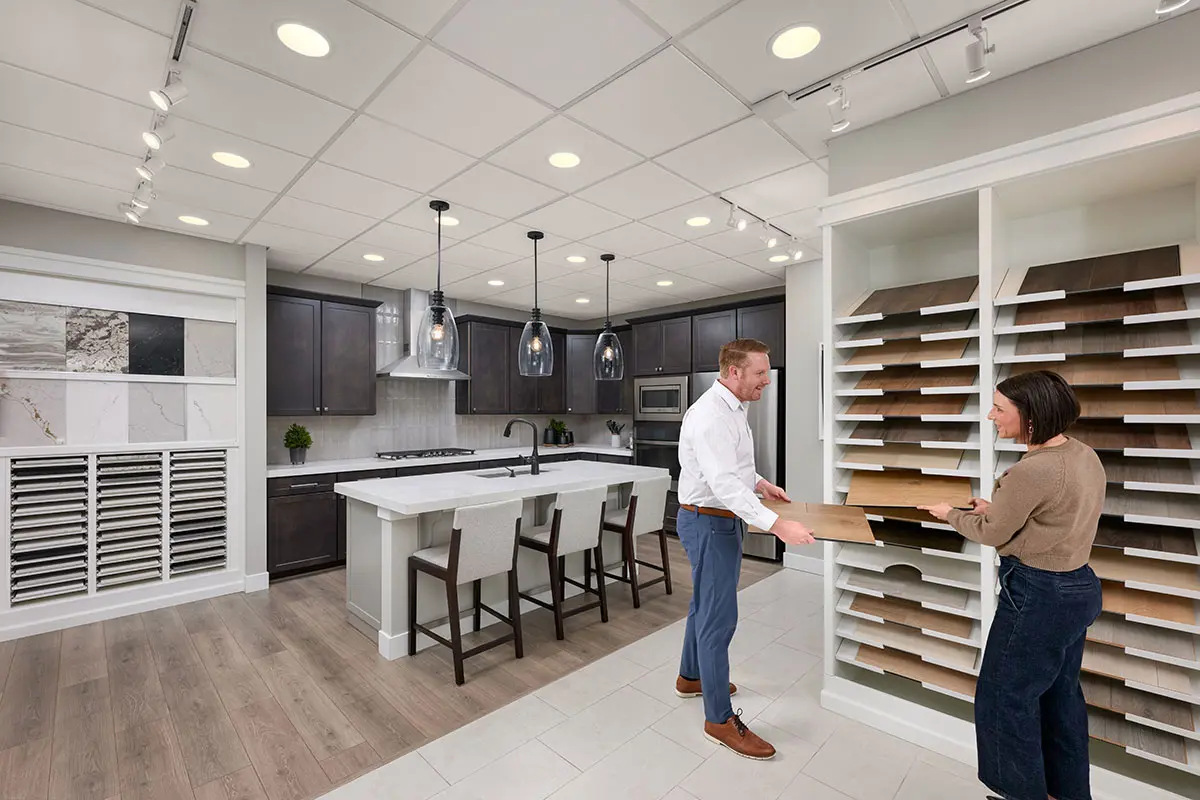 Couple selecting options at a Richmond American Home Gallery