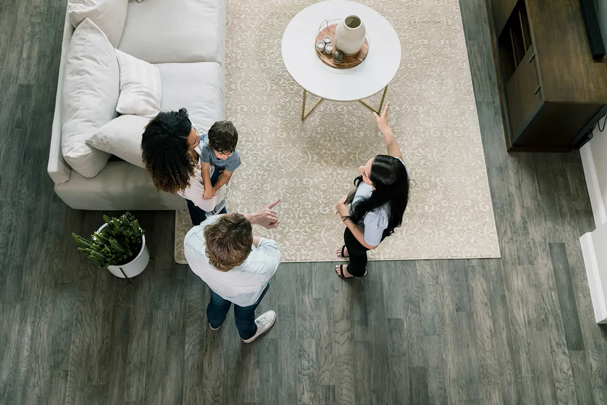 Photo of homebuyers touring a home
