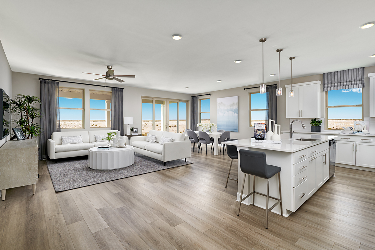 Open kitchen and dining rooms are roomy and inviting