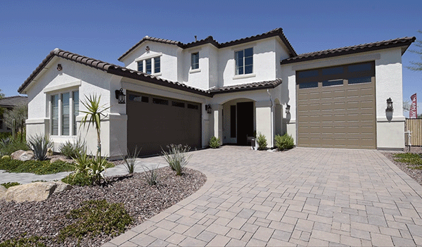 Exterior view of a new home with RV garage. Paulson floor plan in Maricopa, Arizona; near Phoenix.