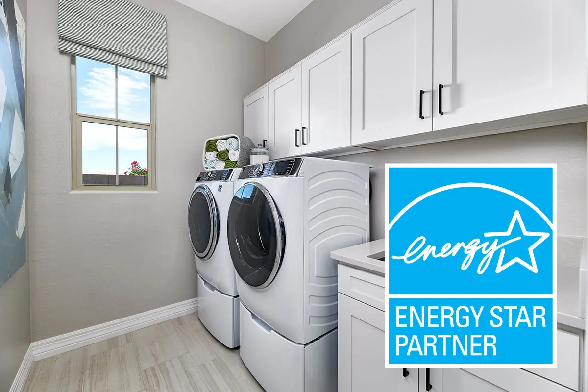 Laundry room with EnergyStar logo over top