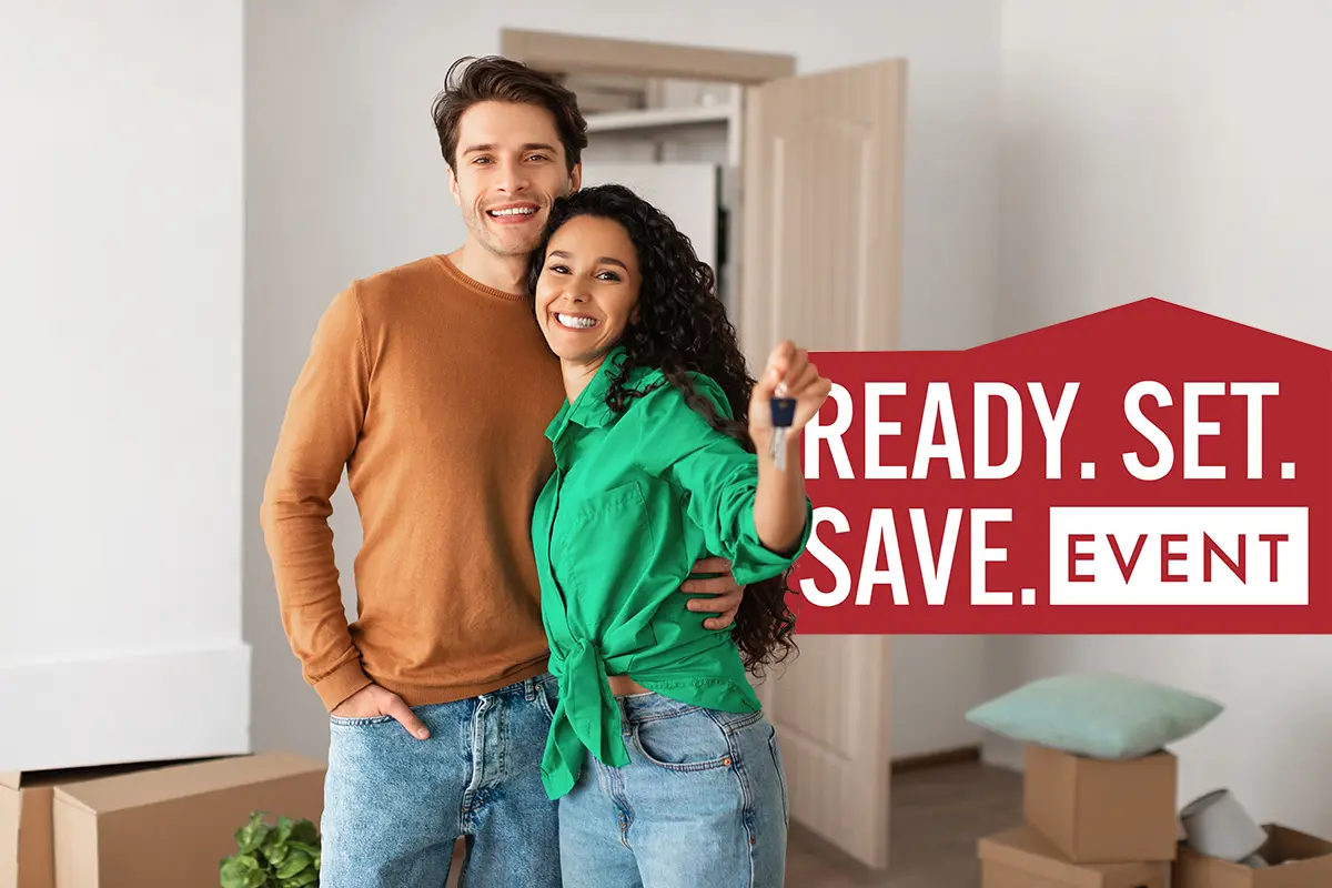 Happy couple holding keys with Ready.Set.Save campaign logo