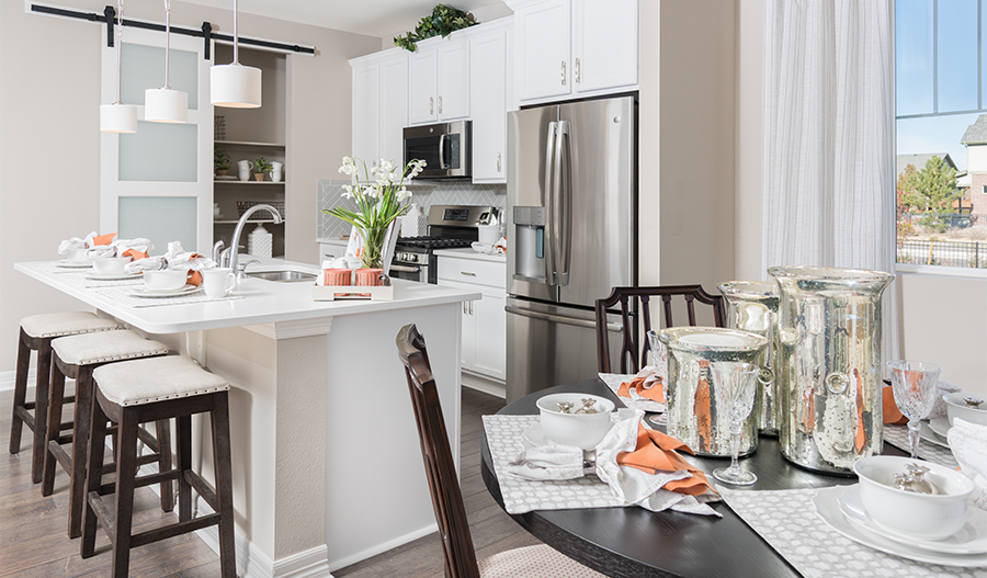 The Coral Kitchen and dining room in the Coral floor plan