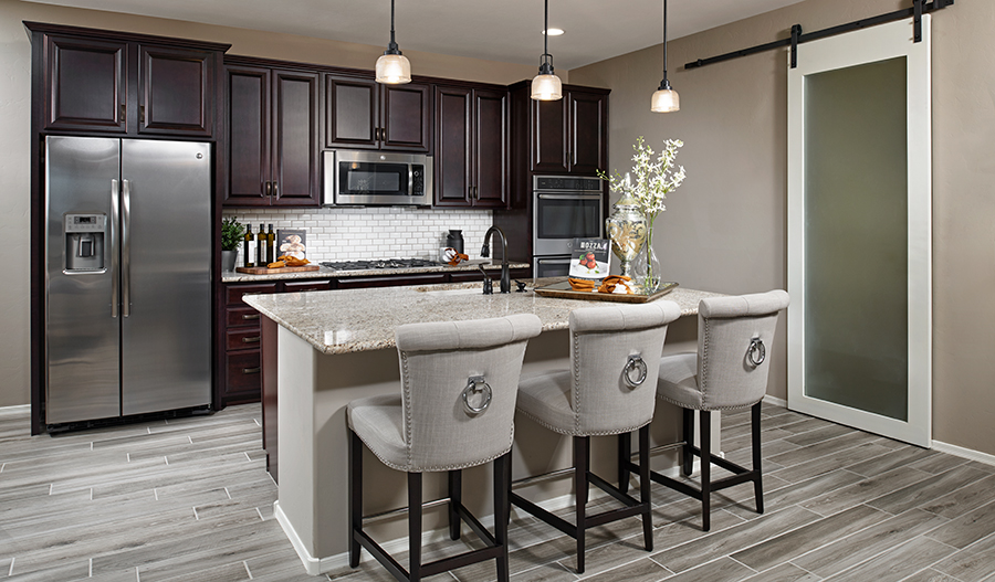Kitchen with center island in the Arlington floor plan