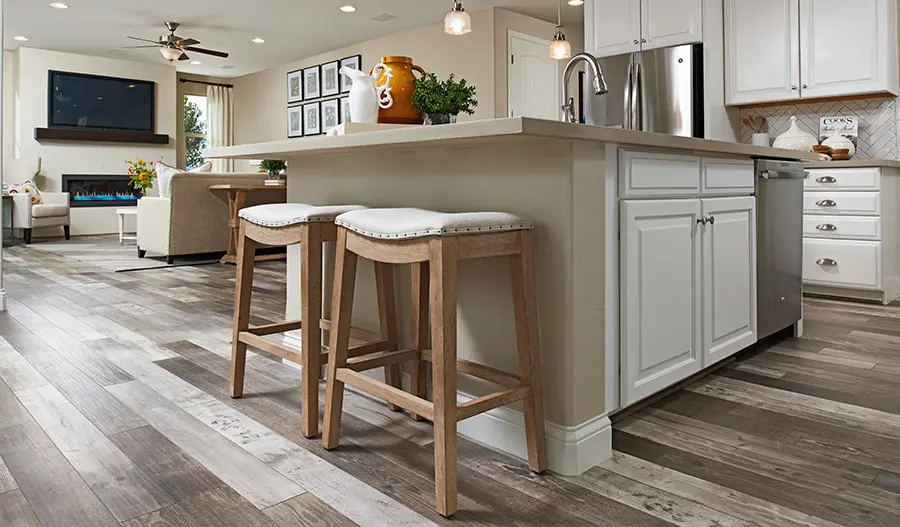 Kitchen and great room in the Sage floor plan