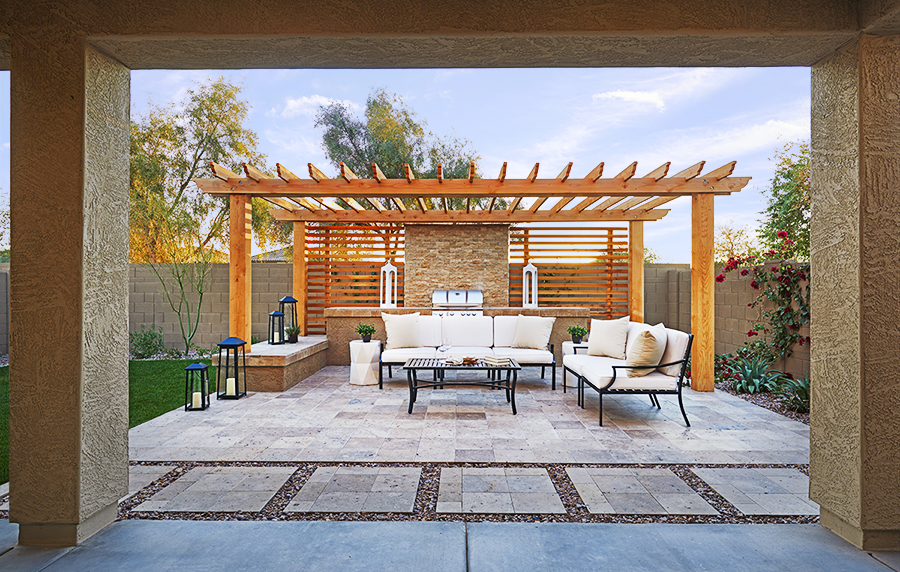 Patio with sitting area and grill in the peridot floor plan