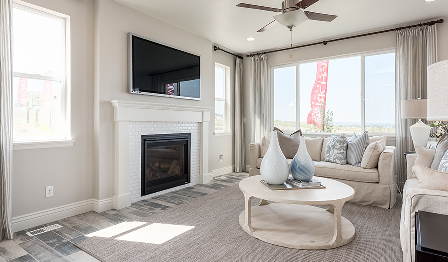 The Leah Greatroom and fireplace of the Leah plan in South Hills