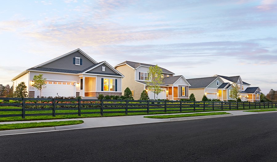 Four single and two-story Richmond American Homes on a sunny street