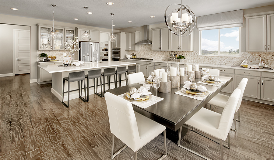Kitchen and dining area of the Melody plan in Cobblestone