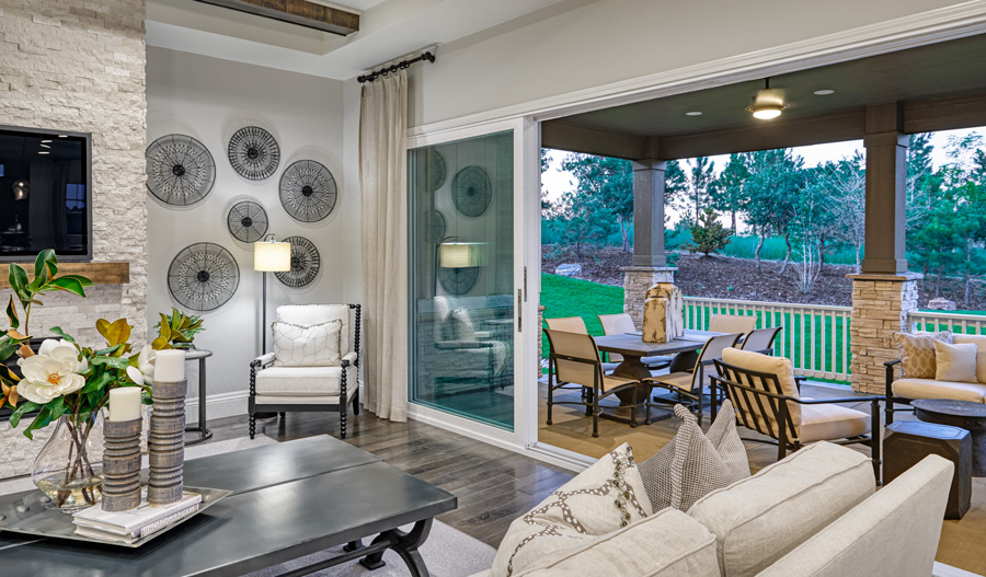Family room and patio of the Holbrook plan in Denver