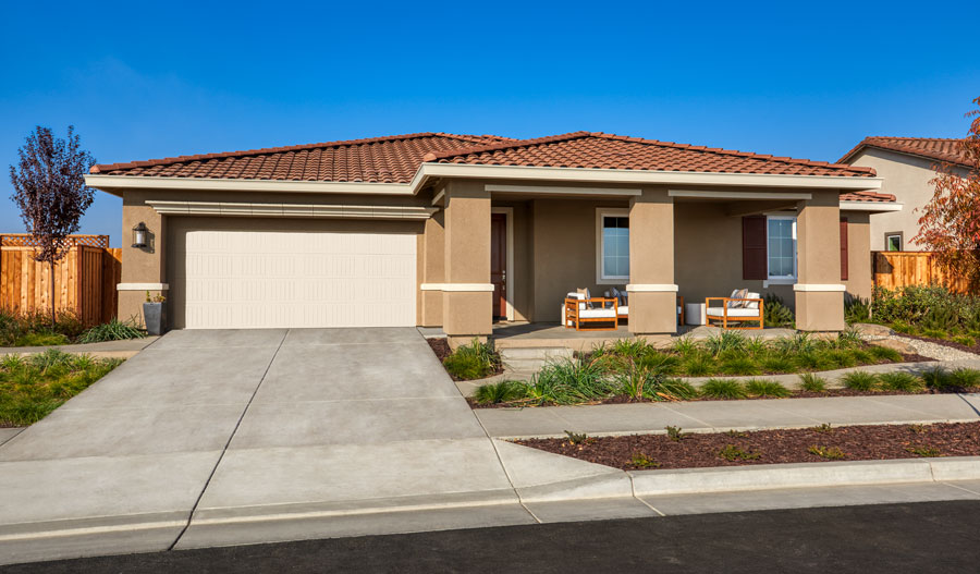 Front of a ranch-style home with a covered porch