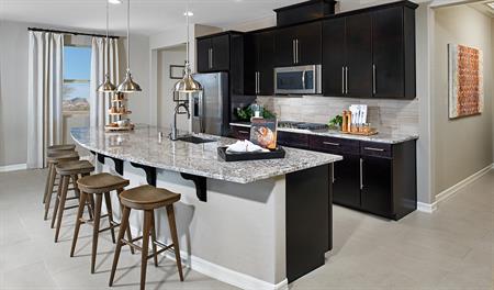 Kitchen with large center island in the Rincon floor plan