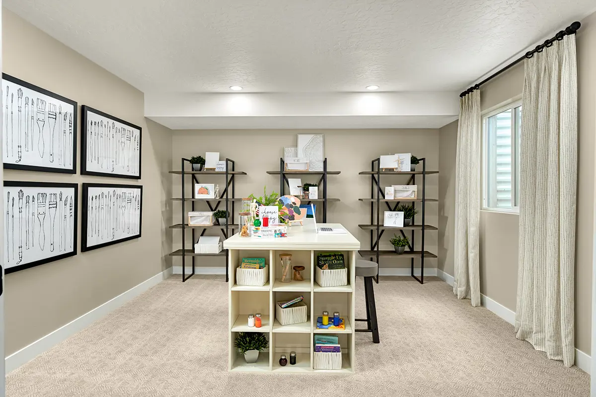 Craft room with a desk and shelving