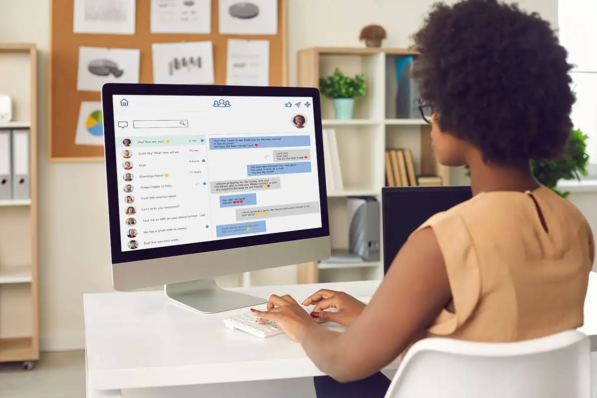 Woman on computer chatting online