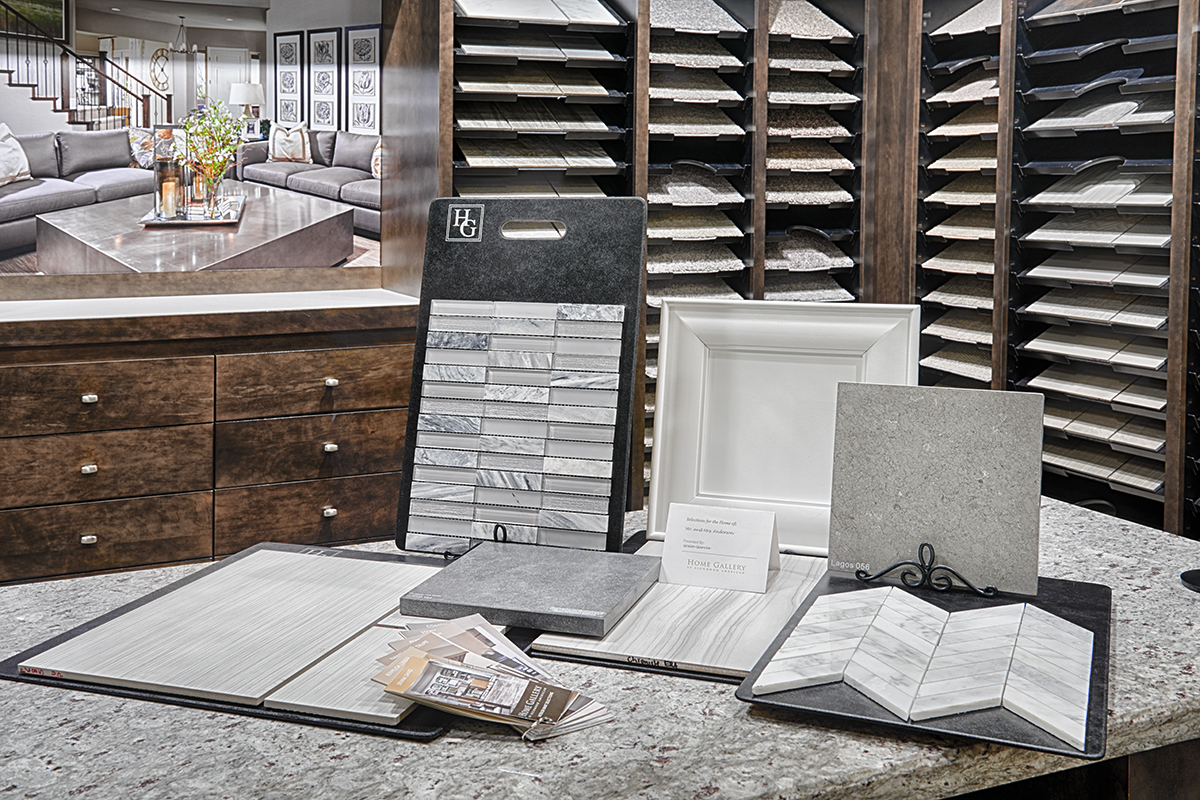 Coordinating tile and cabinet samples set up on counter