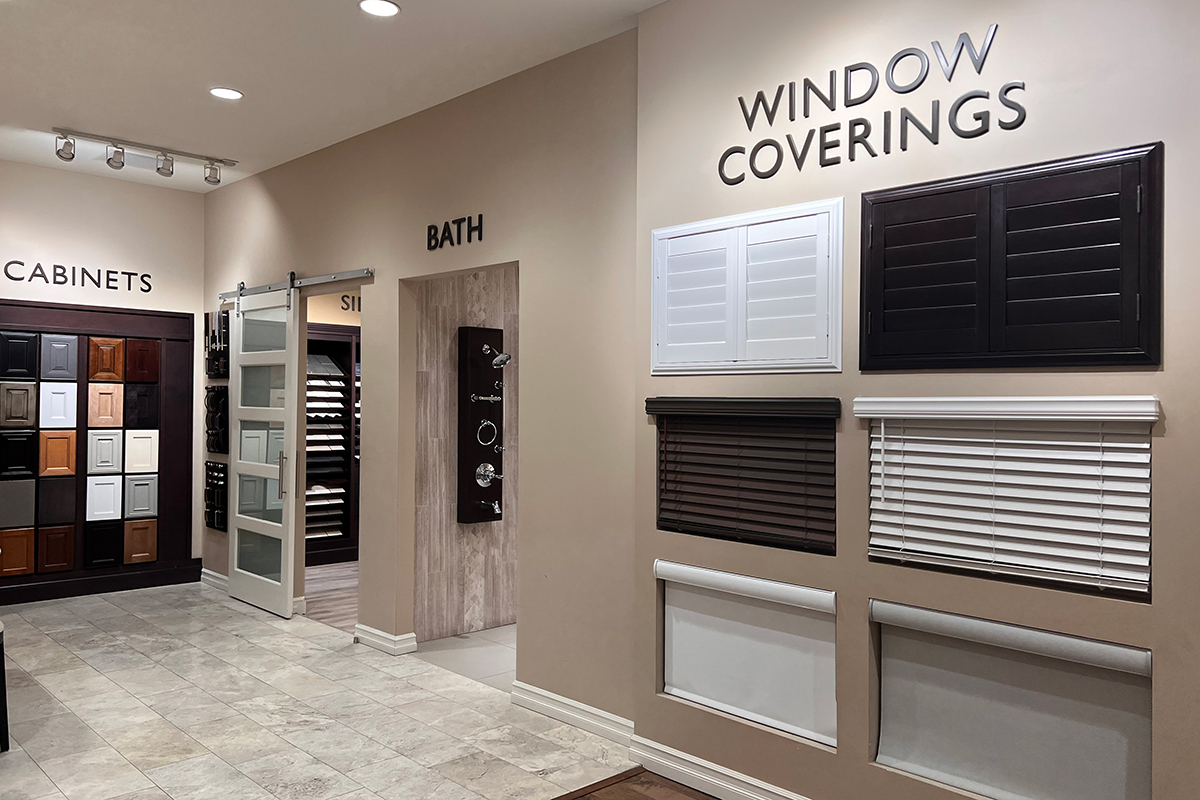 Home Gallery room with window coverings display, bath faucet display, and cabinets display